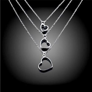 925 Sterling Silver necklace, three chains with three heart pendants.